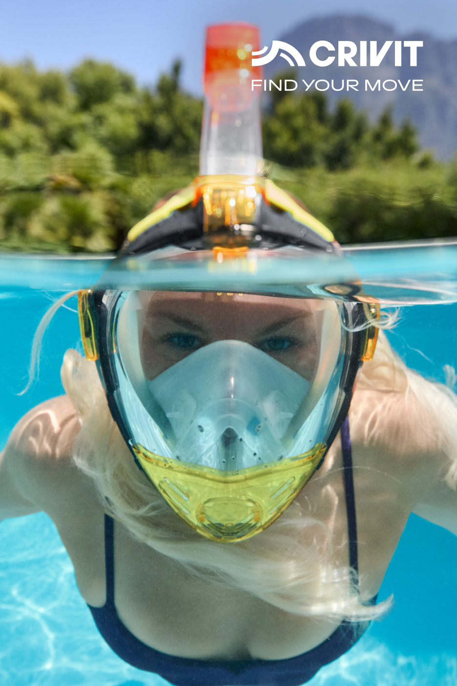 Femme blonde avec masque de plongée intégral, nageant sous l'eau, avec le slogan 'FIND YOUR MOVE'.