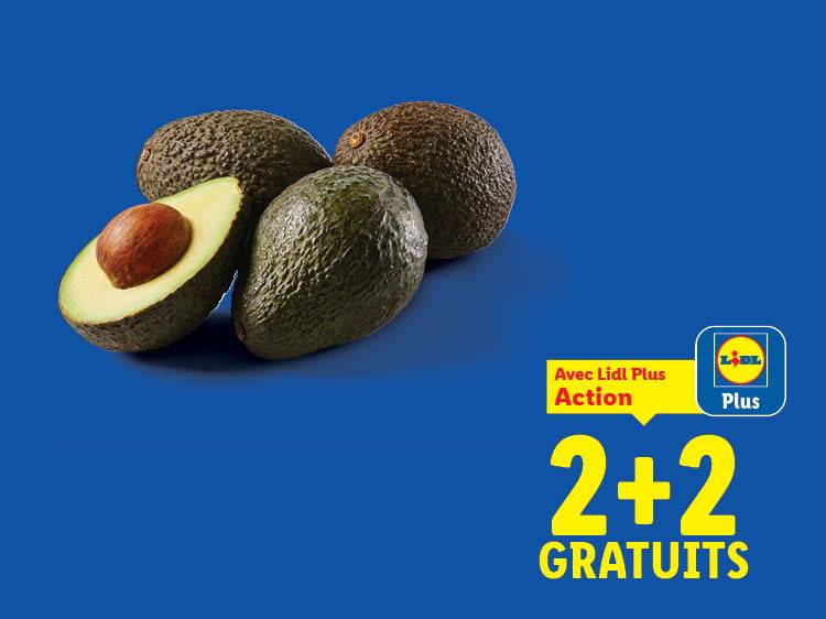 Avocats frais, dont un coupé en deux, avec une offre promotionnelle 2+2 gratuits.