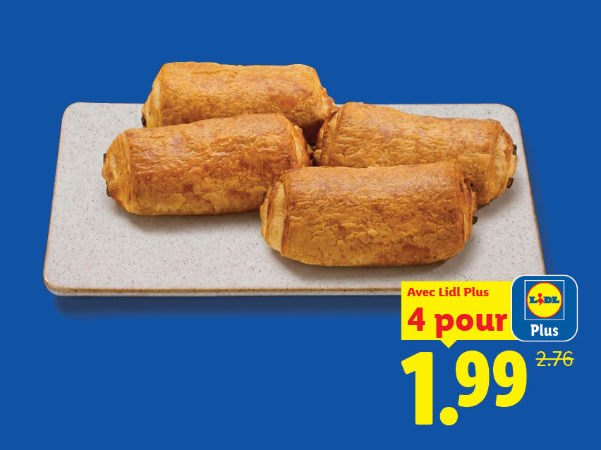 Quatre pains au chocolat sur un plateau avec une offre promotionnelle à 1,99 €.